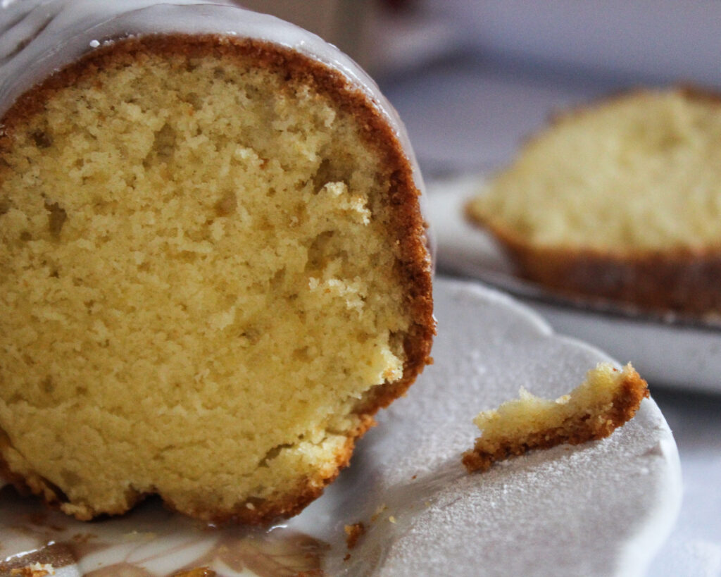 Close up of a vanilla Bundt cake on a plate