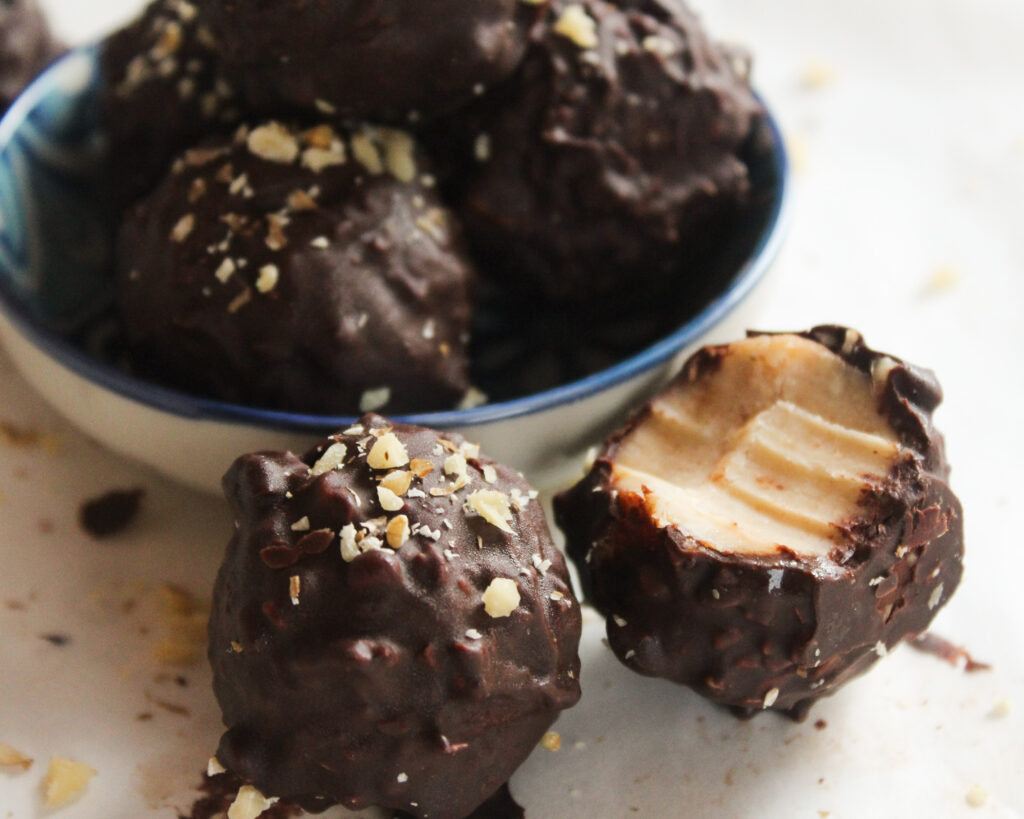 Cookie truffles decorated with walnuts